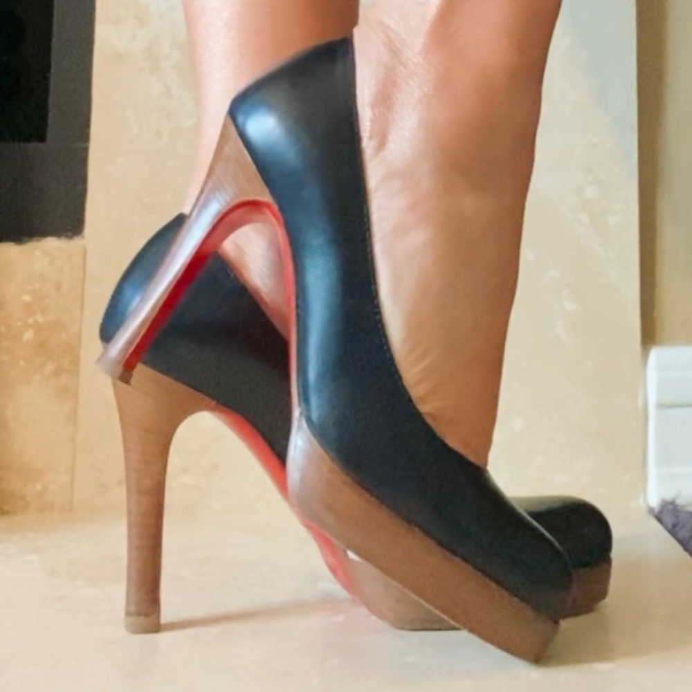 Christian Louboutin black round toe platform heels